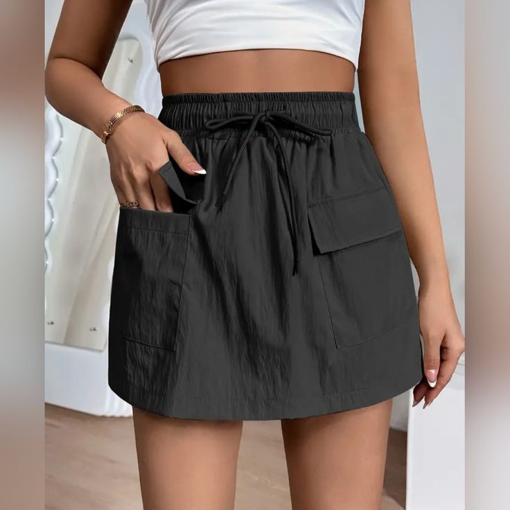 New - Never Worn Elastic Waste Runs One Size Big (Roughly 12) Black Spring Skort With Pockets, Spring Black Skort With Pockets, Summer Black Shorts With Pockets, Casual Summer Skort With Pockets, Black Summer Bottoms With Pockets, Casual Skort With Side Pockets, Casual Black Skort For Spring, Black Bottoms With Pockets For Day Out, Summer Shorts By Amazon