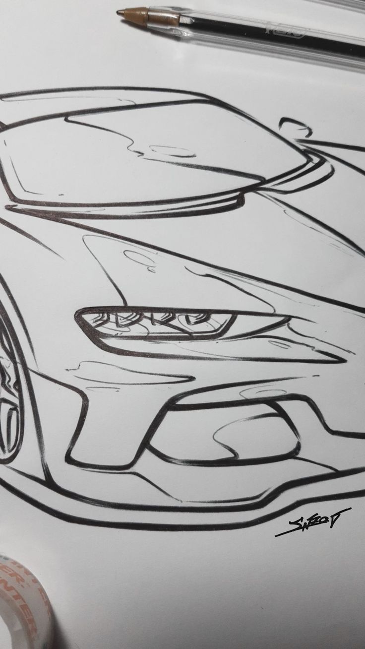 a drawing of a sports car is shown in black and white with a pen on it