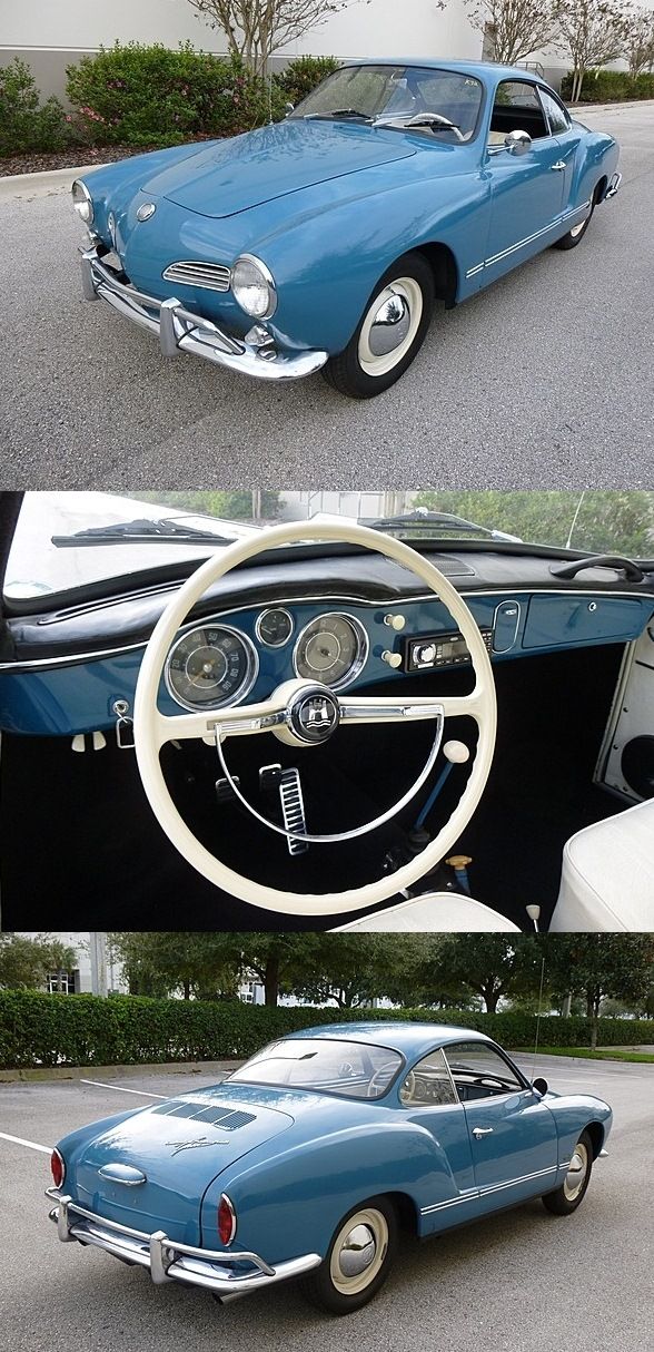 an old blue car is parked in the parking lot next to another classic car that has been restored