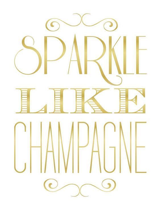 the words sparkle like champagne in gold foil