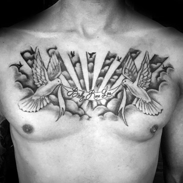 a man's chest with some birds on it and the words love is in the middle