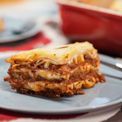 a piece of lasagna on a blue plate