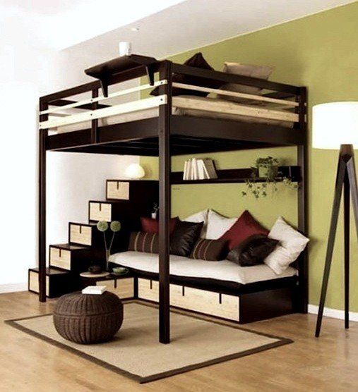 a loft bed is in the middle of a living room with a couch underneath it