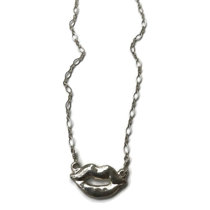 Add a touch of sass with these perfectly puckered lips. Hand-sculpted. Available in sterling silver or bronze. Each necklace is made to order and usually ships in 2-4 weeks from artist's studio in Southern California Hand-carved lips pendant approx 1" Adjustable Length approx 16"-18" Handcrafted in the USA Lips Jewelry, Lip Jewelry, 14kt Gold, Artist Studio, Gold Filled, Hand Carved, Chain Necklace, Lips, Jewelry Design