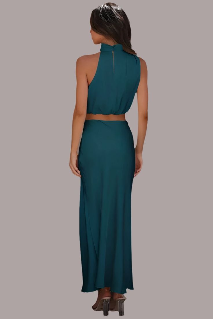 Transform your wardrobe with our GYPSY Cropped Turtle Neck Tank Top and Maxi Skirt Set. Experience elegant vibes with a casual kick, perfect for any occasion. Elevate your style with this must-have set! PRODUCT MEASUREMENTS (INCH) 🌗 SIZE BUST WAIST/bottoms HIPS SHOULDER LENGTH/bottoms XS S 37.8 24.6 35.9 M 39.8 26.5 36.3 L 41.7 28.5 26.7 XL 44.9 31.6 37.1 1X 2X MATERIAL: 100% polyester Stretch: No stretch Care instructions: Machine wash cold. Tumble dry low. Casual Maxi Skirt For Night Out, Fitted Green Maxi Skirt For Night Out, Casual Fitted Maxi Skirt For Date Night, Chic Green Maxi Skirt For Night Out, Chic Two-piece Green Skirt, Chic Green Two-piece Skirt, Flowy Two-piece Maxi Skirt, Chic Full-length Maxi Skirt For Beach, Spring Beach Two-piece Maxi Skirt