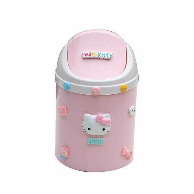 the hello kitty lunch box is pink and has white trimmings on it's sides