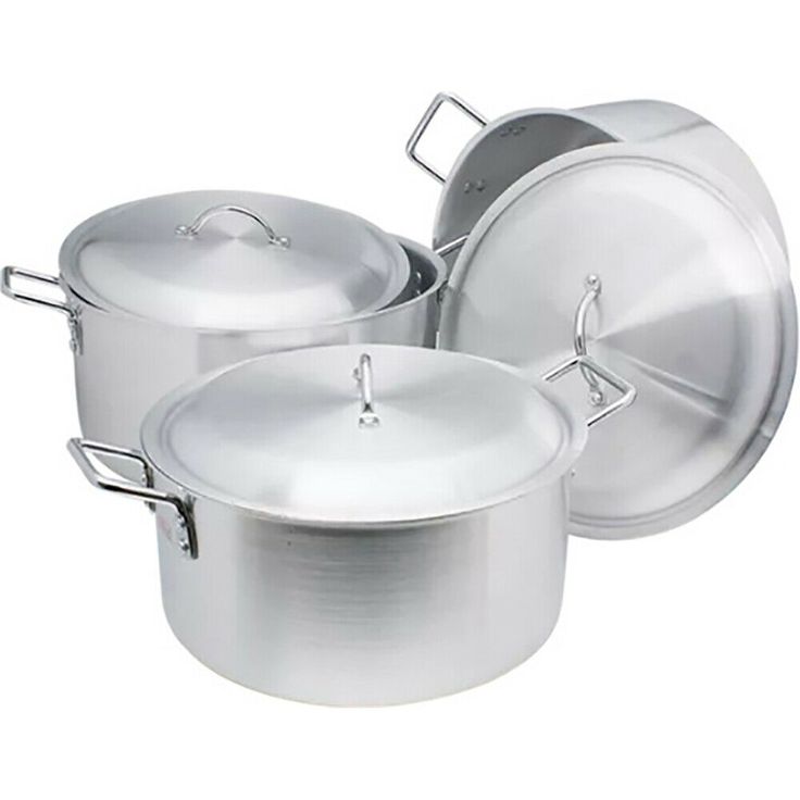 three pots and pans with lids on white background