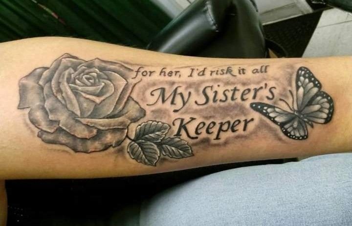 a person with a tattoo on their arm that says for her, i trust it all my sister's keeper