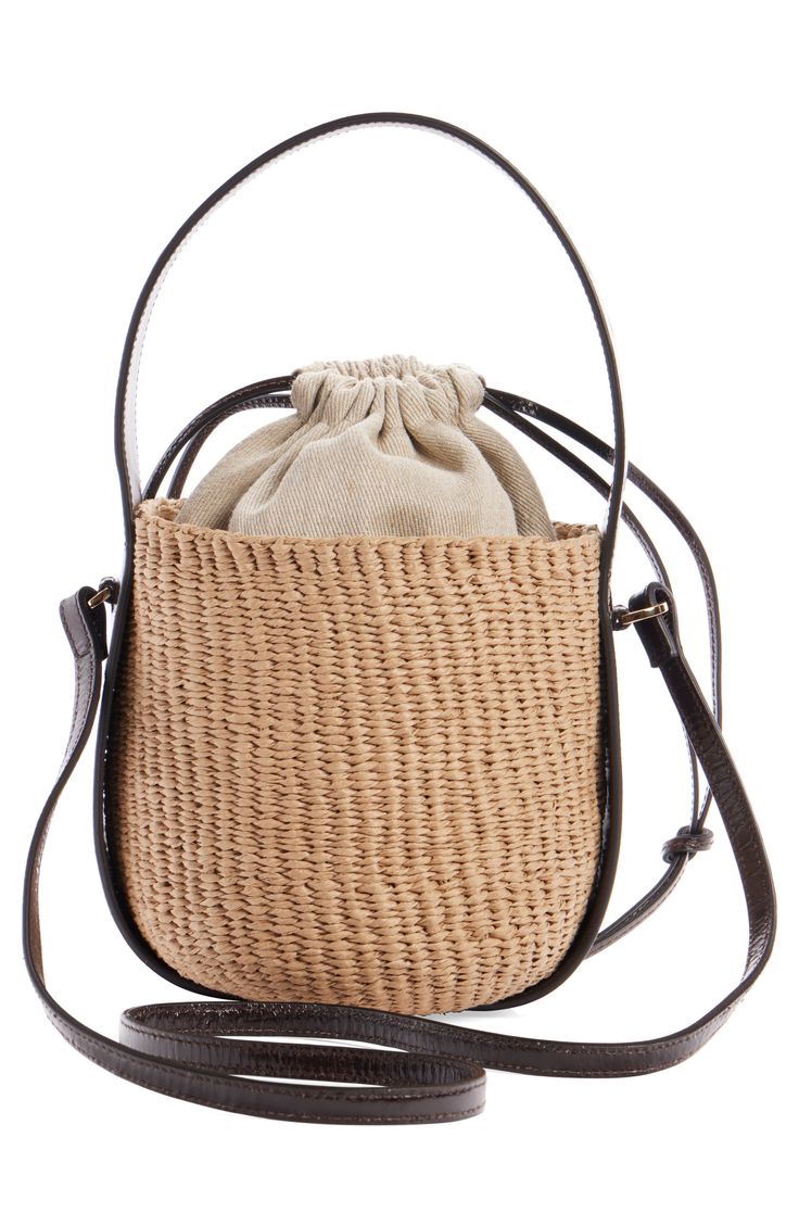 Elevate your warm-weather look with this compact basket bag designed with a drawstring lining and a leather version of the logo-embellished Woody strap. Drawstring closure Top carry handle; crossbody strap Lined Paper straw with leather trim Made in Italy Designer Handbags This brand has B Corp certification, representing business practices with emphasis on social and environmental performance, accountability and transparency This brand meets Nordstrom Responsible Brands criteria: brand adheres Natural Bucket Bag With Removable Pouch, Woven Pouch Bucket Bag For Shopping, Travel Straw Bag With Removable Pouch Bucket Shape, Natural Color Bucket Straw Bag With Removable Pouch, Luxury Spring Bucket Bag For Daily Use, Travel Straw Bag With Removable Pouch, Woven Crossbody Bucket Bag For Shopping, Modern Leather Bucket Bag For Vacation, Luxury Straw Bucket Bag For Shopping