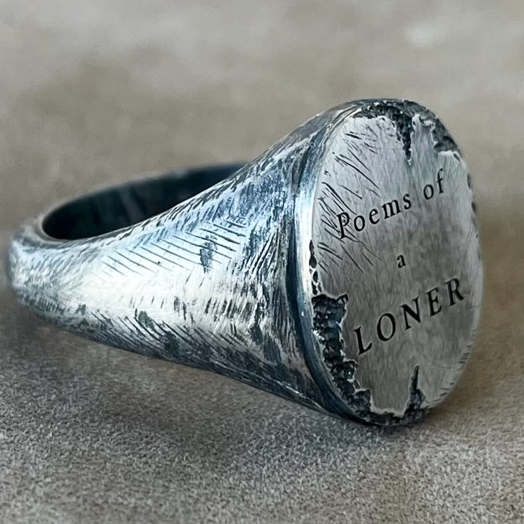 The Loner assumes the role of the intimate narrator within an endless tale, resonating in parallel with the grand odyssey of love. This signet ring is made of solid Sterling Silver Width: 15.30mm Made by Tó Garal from Spain, this ring is available to try on in our Boulder, Colorado Jewelry Store.