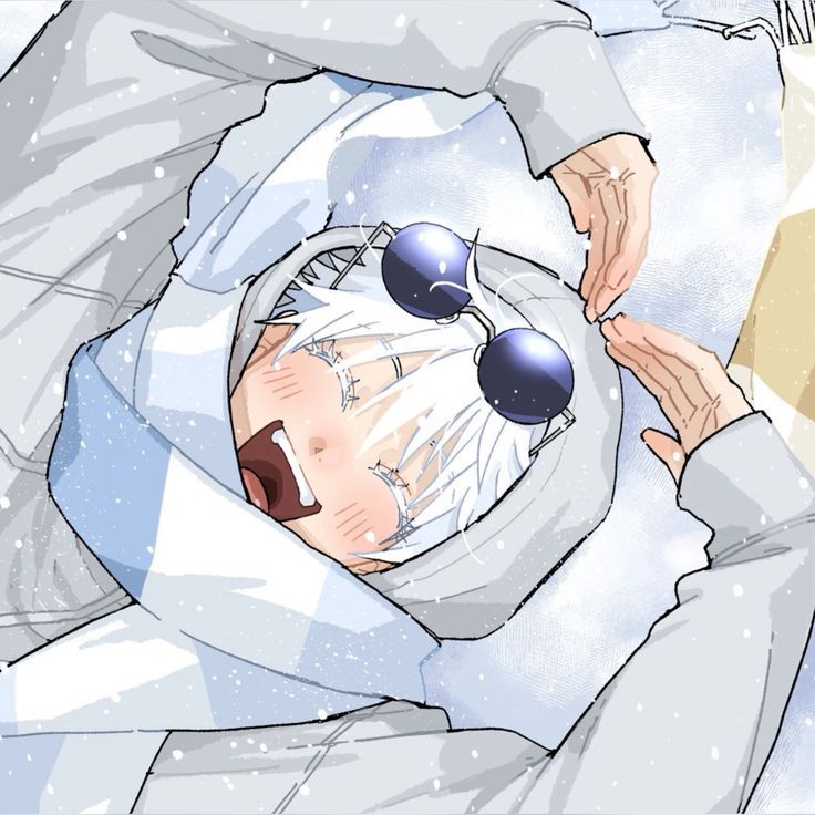 a person with sunglasses on their head is in the snow and has his eyes closed