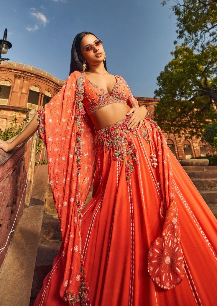 Orange luckhnavi lehenga set in chiffon with resham and kamdani work. Luckhnavi Lehenga, Kalki Fashion Lehenga, Corset Lehenga, Light Lehenga, Kamdani Work, Lucknowi Lehenga, Fish Cut Gown, Wedding Dress And Shoes, Outfits For Groom