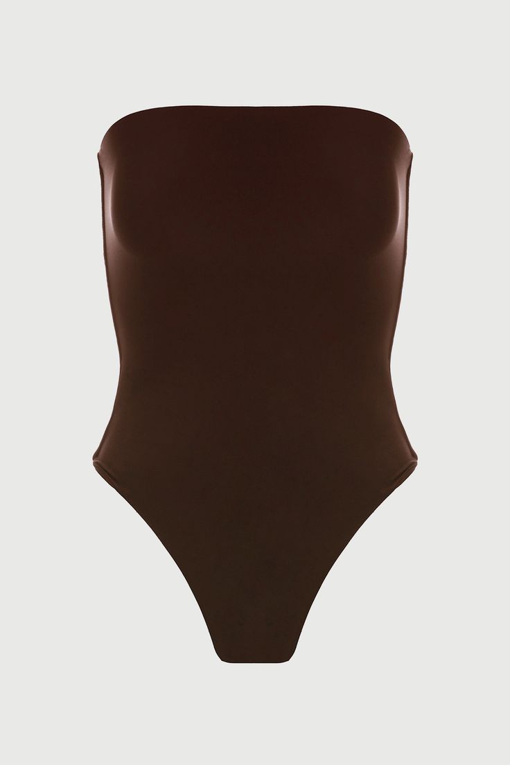 Far from basic. Our form-conscious bodysuit features a straight neckline and our signature double-lined fabric for a close, comfortable fit that won’t slip or chafe. Finished with a thong back and snap closure for seamless styling versatility. NW Collection Import 95% Viscose, 5% Spandex Model wears size X-Small True to size This bodysuit is double-lined All Bodysuits Are Final Sale Basic Bodysuit, Naked Wardrobe, Straight Neckline, Womens Bodysuit, Denim Pants, Snap Closure, Jumpsuit Dress, Your Style, Final Sale