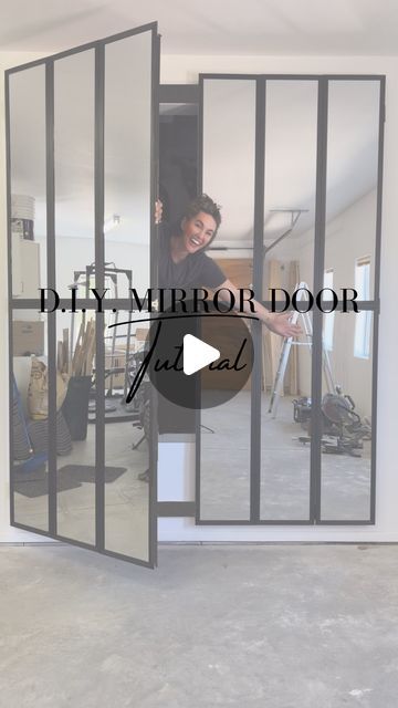 the mirror door is open to reveal a woman's reflection