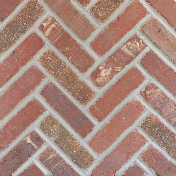 an image of a brick wall that looks like it is made out of red bricks