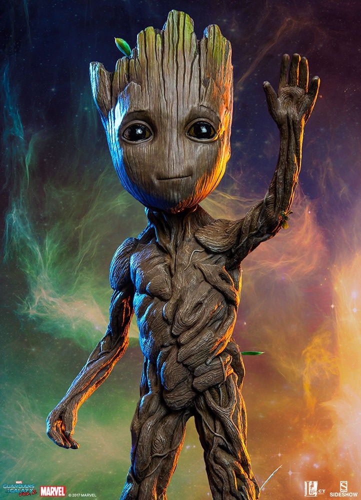 an image of a baby groote from the avengers movie, with his hands in the air