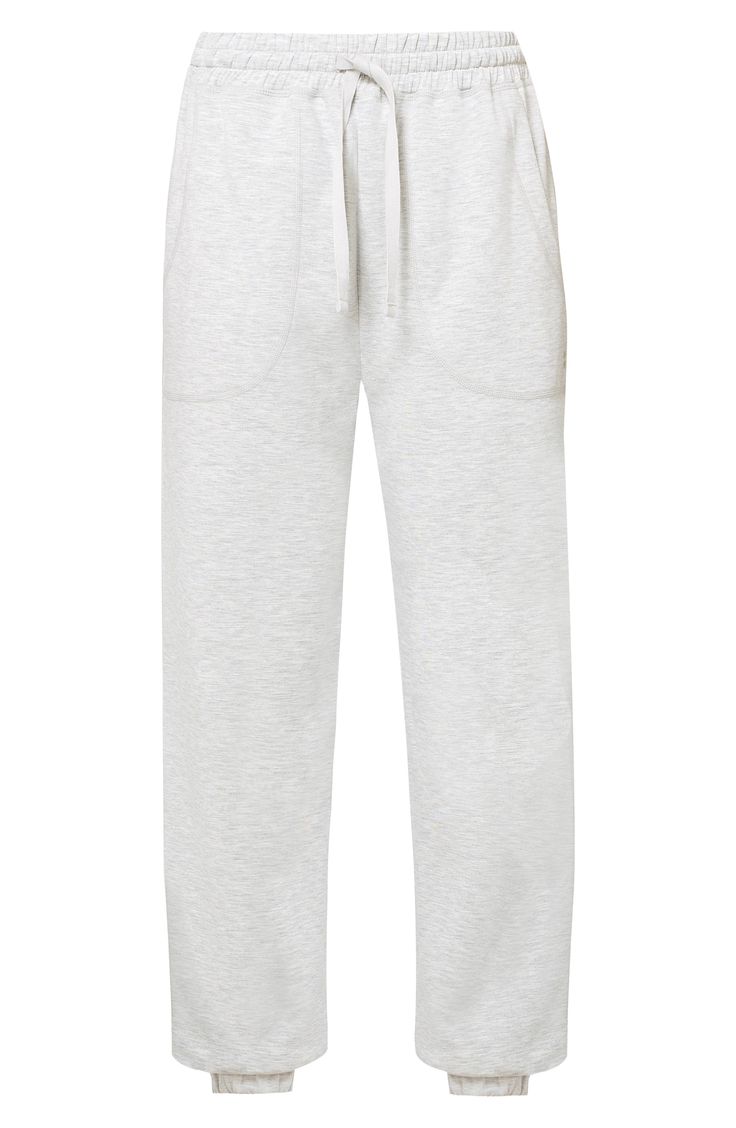 Whether hitting the couch, stopping by the gym or running errands, you'll love these cozy sweatpants made with handy pockets and cut from a scuba-like fabric. 28" inseam (size Medium) Elastic/drawstring waist Front welt pockets 57% polyester, 35% modal, 8% elastane Machine wash, dry flat Imported Sporty Breathable Sweatpants With 4-way Stretch, Sporty 4-way Stretch Breathable Sweatpants, Gray Stretch Sweat-resistant Bottoms, Soft-washed Cotton Sweatpants, Gray Moisture-wicking Relaxed Fit Sweatpants, Cozy Sweatpants, Sweaty Betty, Drawstring Waist, Welt Pocket