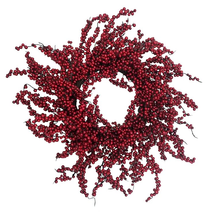 a red berry wreath on a white background