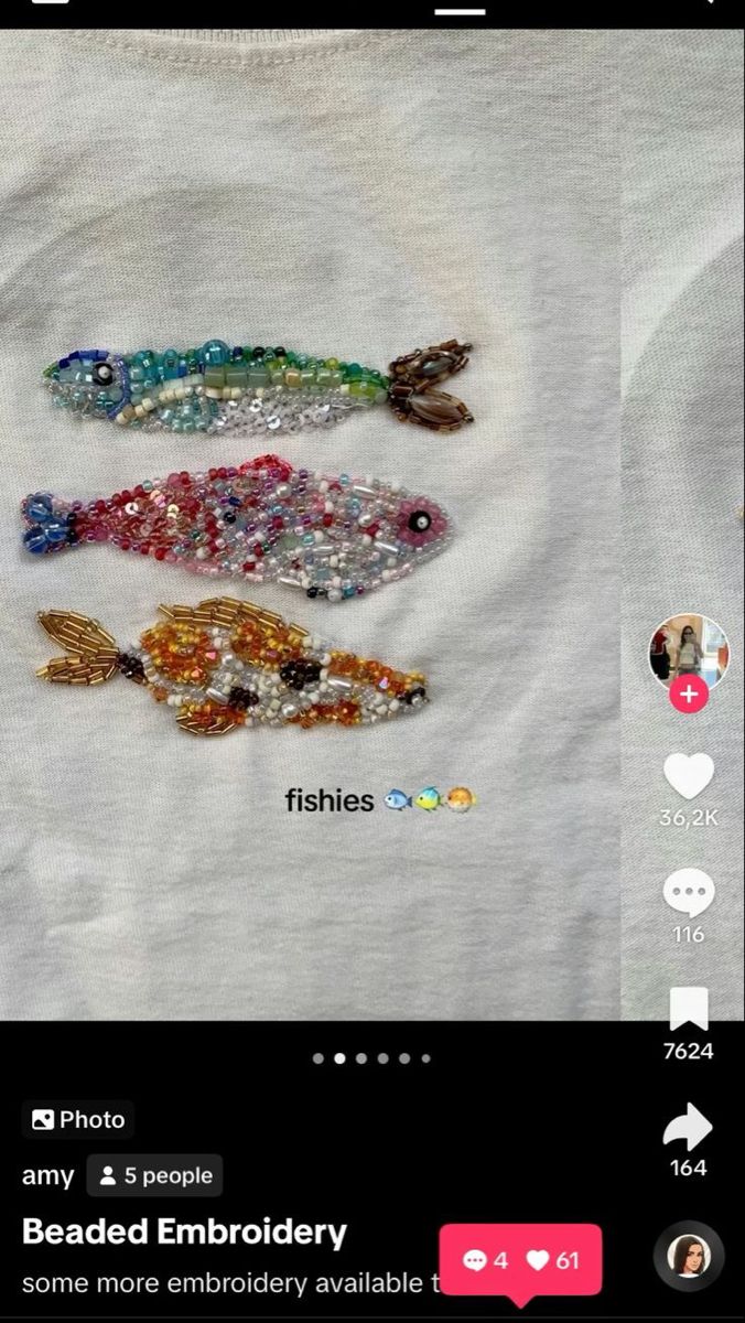 an image of three fish on a t - shirt with beaded embroiderry