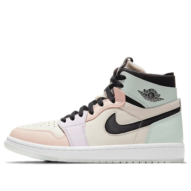 This Air Jordan 1 Zoom Comfort "Easter" has been constructed in a pastel color hue that is inspired by the Easter eggs themselves. It features a cream-colored tumbled leather serving as the base of the upper while purple and pink leather overlays appear at the forefoot and light green accents appear on the heel counter and ankle collar. The Swoosh is made of mesh. The Jumpman logo is embossed, the black laces and tongue add further contrast, while the white covers the opaque sole edged with a be Air Jordan 1 Zoom Comfort, Air Jordan 1 Zoom Cmft, Jordan 1 Zoom Cmft, Easter 2021, Preppy Shoes, Nike Shoes Jordans, Womens Air Jordans, Jordan 1s, Wings Logo