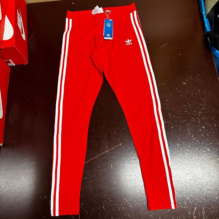 Adidas Womens Red Skinny High Rise Waist Classic 3 Stripes Pull On Tights Brand: Adidas Department: Womens Size: L/M Color: Red Type: Leggings Style: Compression Pattern: Striped Theme: Sports Occasion: Activewear Season: All Season Features: Elastic Waist, Comfort Leg Style: Skinny Condition: New With Tags I Offer Discounts For All Return Customers. - Jvs Red Stretch Cotton Activewear, Stretch Sportswear Pants In Red, Red Stretch Sportswear Pants, Red Elastane Sports Tights, Sporty Red Elastane Tights, Red Tight Athleisure Pants, Adidas Red Bottoms For Spring, Red Adidas Bottoms For Spring, Sporty Red Activewear With Three Stripes