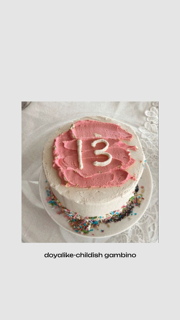 a birthday cake with pink frosting and sprinkles on it that says 31