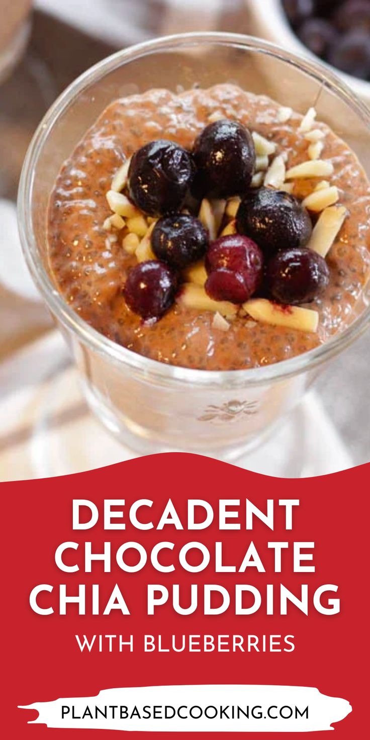 chocolate chia pudding with blueberries and almonds in a glass bowl on a table