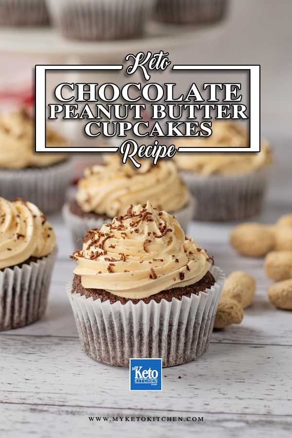 chocolate peanut butter cupcakes with frosting and nuts on the side, in front of other cupcakes