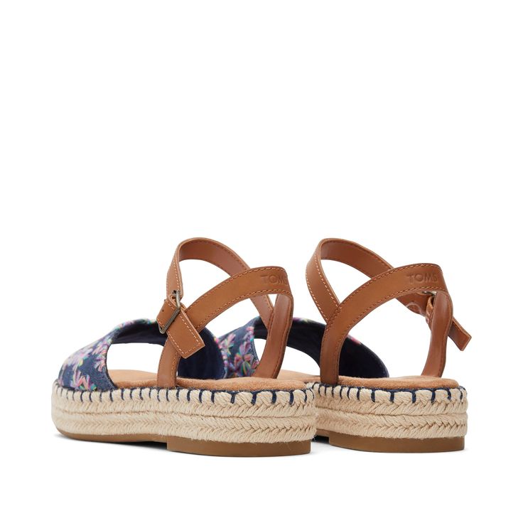 Meet our most walkable espadrille yet! Abby embroidered sandals feature that just-right everyday flatform height, playful embroidered flowers, and a minimalist silhouette secured with an ankle strap. Abby delivers effortless style for everything on your agenda. Textile and leather upper with embroidered floral detailing. TOMS leather products support responsible manufacturing via the Leather Working Group. Rubber outsole. Non-removable, high-rebound comfort OrthoLite® Eco X40-Hybrid™ insole made Embroidered Sandals, Minimalist Silhouette, Spark Joy, Espadrille Sandals, Navy Leather, Leather Products, Embroidered Flowers, Leather Working, Flat Sandals