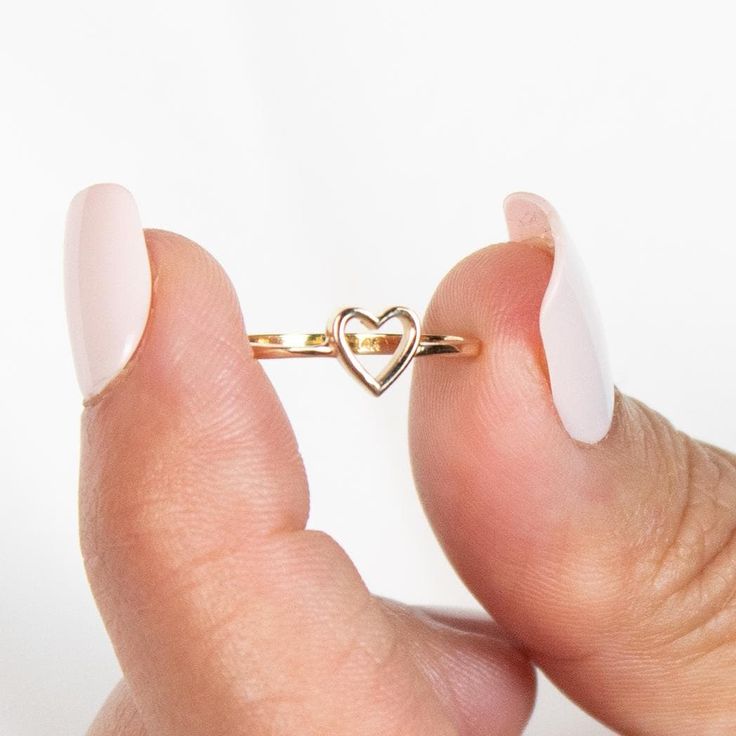 14k Heart Ring | Solid Gold Ring | Stacking Ring | Gold Dainty Ring | Gold Heart Ring | Gold Pinky Ring | Minimalist Ring | Valentines Gift ➔ Made to Order ➔ Gold Karat: 14K gold ➔ Band Width: 1.5mm (Please note that due to variations in computer/phone screens and the natural stones we use, the color of stones may vary) This ring is made to order, please allow 3-10 business days before shipping. Want it sooner? Ask us and we will let you know if it's possible! ♦︎ Check out more about our shop at: https://etsy.me/3qqqait ♦︎ Any Questions or Comments? Contact us Below: https://etsy.me/3twDq7a Go direct to our categories: Diamond Rings: https://etsy.me/4adgGMQ Diamond Earrings: https://etsy.me/41ldoTQ Diamond Necklaces: https://etsy.me/3TjKqBD Diamond Wedding Bands: https://etsy.me/3uSyCw5 Ru Dainty Tiny Heart Ring In 14k Gold, Dainty 14k Gold Tiny Heart Ring, Minimalist Heart Ring With Open Heart Charm, Minimalist Open Heart Ring With Heart Charm, Stackable Heart Ring For Everyday And Valentine's Day, Dainty Open Heart Rings For Everyday, Everyday Stackable Heart Ring For Valentine's Day, Delicate Heart Ring For Everyday Valentine's Day, Delicate Everyday Heart Ring For Valentine's Day