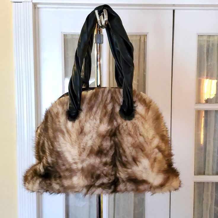 Beautiful Paolo Masi Handbag. Genuine Mink. Double Twisted Handles. Interior Backwall Zip Pocket And Accessories Pocket. Leather Bottom Panel. 5 Gold Feet For Added Protection. Brand New Comes In Original Paolo Masi Drawstring Bag. Chic Shoulder Bag With Faux Fur Lining For Shopping, Chic Travel Shoulder Bag With Faux Fur Lining, Elegant Rectangular Shoulder Bag With Faux Fur Lining, Brown Bag With Faux Fur Lining For Shopping, Brown Shopping Bag With Faux Fur Lining, Elegant Evening Shoulder Bag With Faux Fur Lining, Elegant Evening Bags With Faux Fur Lining, Chic Brown Bag With Faux Fur Lining, Chic Evening Shoulder Bag With Faux Fur Lining