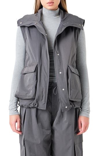 Everyone's favorite for the 'between' season, this roomy vest boasts plenty of pocket space for your out-and-about essentials. Front snap closure Stand collar Front flap-patch bellows pockets Lined 50% polyester, 50% Tencel® lyocell Tencel lyocell is a sustainably produced fiber made with closed-loop processing Hand wash, dry flat Imported Sleeveless Outerwear With Patch Pockets For Fall, Sleeveless Fall Outerwear With Patch Pockets, Fall Sleeveless Vest With Patch Pockets, Functional Spring Vest With Pockets, Spring Functional Vest With Pockets, Functional Sleeveless Vest For Fall, Fall Sleeveless Vest With Side Pockets, Functional Vest With Multiple Pockets For Fall, Functional Fall Vest With Multiple Pockets