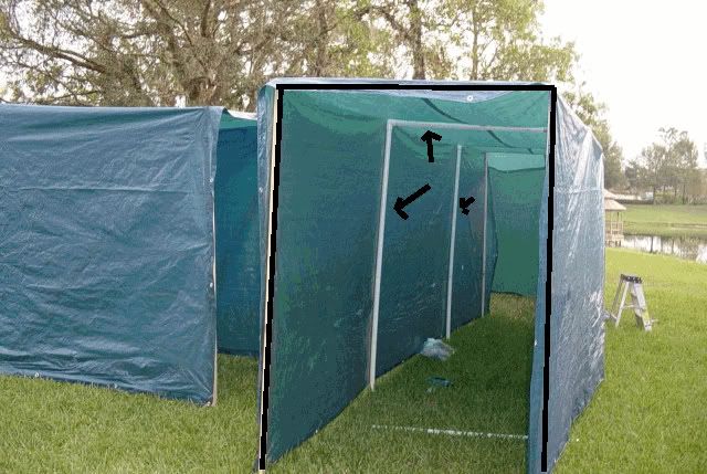 a blue tent with an arrow pointing to it