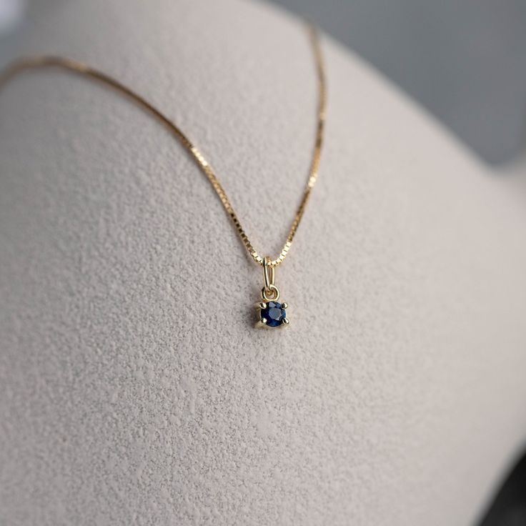 Blue Sapphire pendant in 14K solid yellow gold in prong set. A minimal necklace for women, ideal for a birthday gift, as sapphire is the September birthstone. It is sold as necklace or just pendant without chain. D E T A I L S ● Metal: 14K solid gold, 14K white gold ● Gemstones: Sapphire, round cut 3mm ● Gemstones Weight: Sapphire 0.10 ct ● Length: 40 cm - 16 inches H O W ∙ T O ∙ O R D E R Choose from the drop-down menu the available options (Metal) and leave us a note for any special requiremen Minimalist 14k Gold Diamond Cut Birthstone Necklace, Minimalist 14k Gold Birthstone Necklace With Diamond Cut, Minimalist Yellow Gold Solitaire Necklace With Birthstone, Minimalist Sapphire Birthstone Necklace For Gift, Classic Yellow Gold Sapphire Necklaces, Classic Yellow Gold Sapphire Necklace, Minimalist Sapphire Jewelry In Yellow Gold, Minimalist 14k Gold Birthstone Necklace For Formal Occasions, Minimalist Yellow Gold Sapphire Jewelry