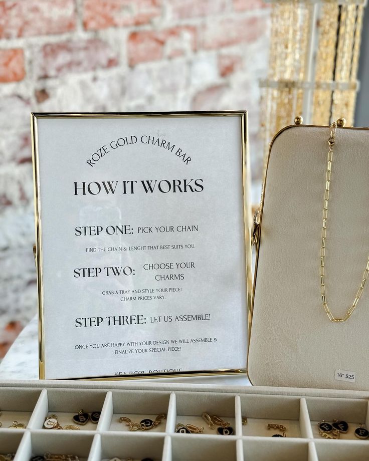 a jewelry box with necklaces in it next to a sign that says how it works