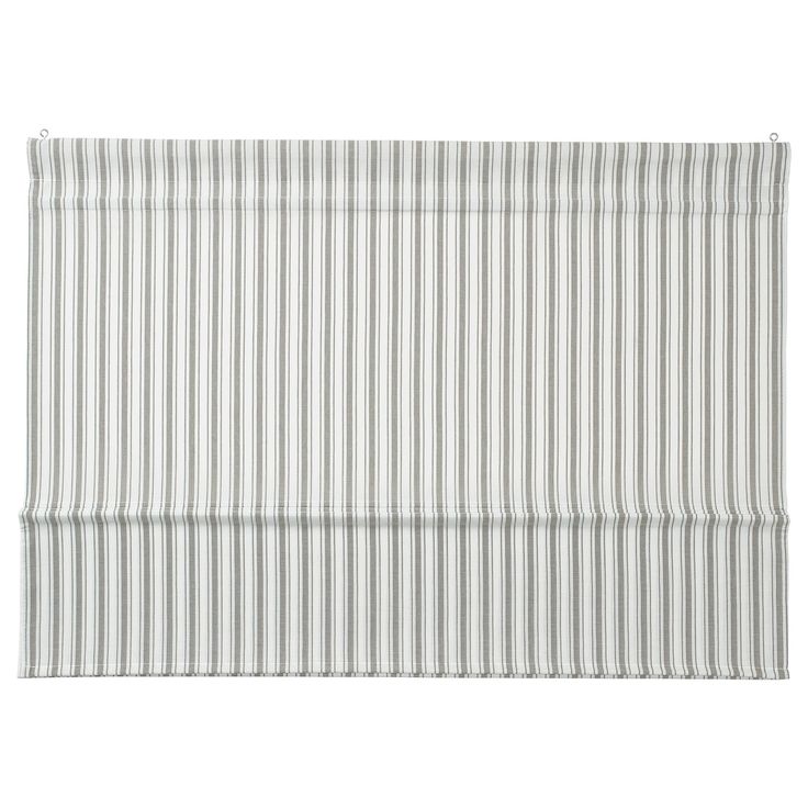 a white and grey striped roman blind