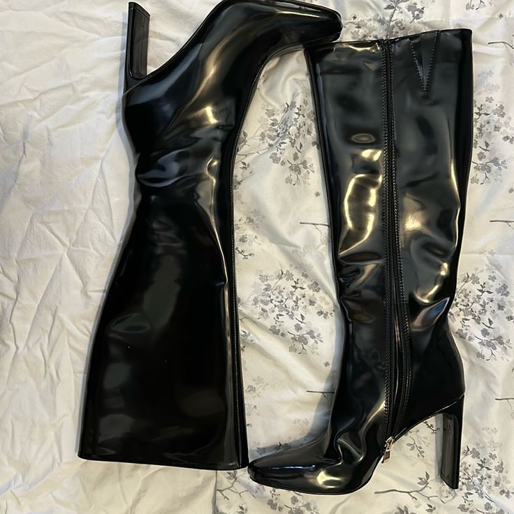 Never Worn Square Toes Black Patent Leather Boots. Zip All The Way Up, Both Work. Definitely For Smaller Calves/Legs. Extremely Cute! Faux Leather Fitted Heels With Zipper Closure, Faux Leather Heels With Zipper Closure, Fitted Faux Leather Heels With Zipper Closure, Polyurethane Knee-high Boots With Round Toe For Party, Faux Leather Knee-high Boots With Round Toe For Club, Club Knee-high Faux Leather Boots With Round Toe, Knee-high Polyurethane Boots For Night Out, Synthetic Round Toe Knee-high Boots For Party, High Heel Polyurethane Knee-high Boots For Party