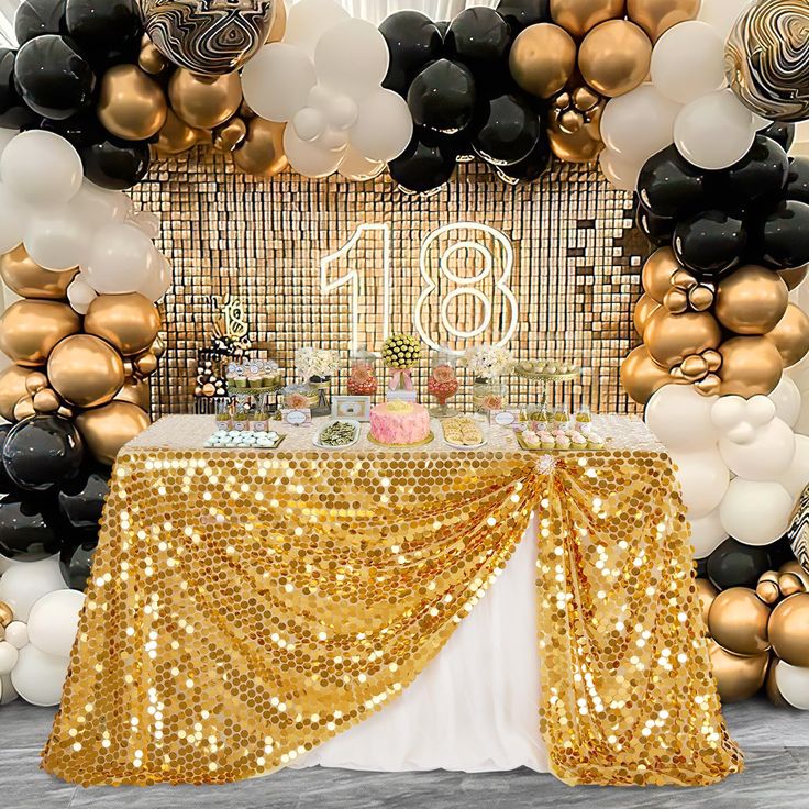 PRICES MAY VARY. Sequin Tablecloth: Sparkly sequin tablecloth is suitable for birthday, cake table, wedding, baby shower, banquet, anniversary dinner and any theme party, halloween, christmas, thanksgiving, valentine's day, other holiday decorations, etc. Gold Sequin Tablecloth: Newly designed sequin fabric for sequin tablecloth, this large payette sequin tablecloth are made of 18MM high quality round sequin on a mesh base. Gold Glitter Tablecloth: The sparkly sequin tablecloth can reflect diffe Silver And Gold Decorations Party Ideas, Sequin Tablecloth Backdrop, Pavilion Party Decorations, Black And Gold Party Decorations Classy, 70 Birthday Party Ideas Decorations, Gold Themed Birthday Party, Black Table Cloth Gold Sequin Runner, 50th Anniversary Table Decorations, Black And Gold Sequin Tablecloth