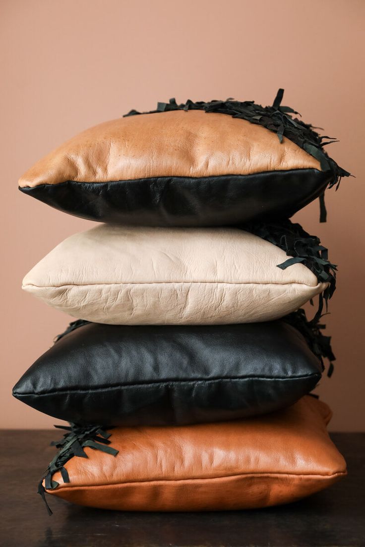 four pillows stacked on top of each other