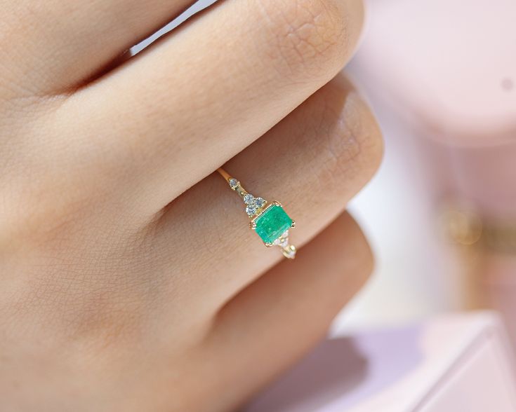 This product is a dainty ring.Using natural stone adds privilege to the product. It can be preferred for all special day or daily using. Emerald                   :      App.   0,55 ct Diamond                 :      App.   0.08 ct G/H VSI  Gram                       :      App.    1.13 GR Product Code        :      LR00060DE   All of our jewelry  is made from solid 14k yellow,white and rose gold.Because of using natural stone, the color of it may differ. All items in our store are 100 % handmade Ring Baguette, Minimal Ring, Zierlicher Ring, Sparkly Earrings, Solitaire Necklaces, Eternity Ring Diamond, Best Diamond, Baguette Cut, Lovely Jewellery