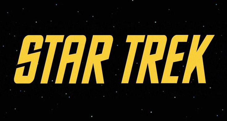 the title for star trek, written in yellow on a black background with stars around it