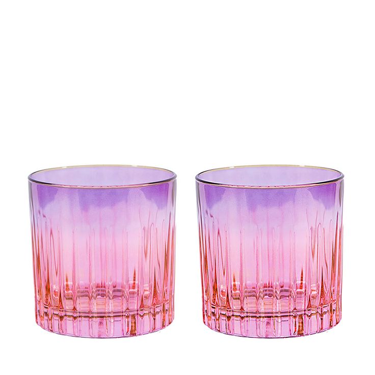 two pink glasses sitting next to each other