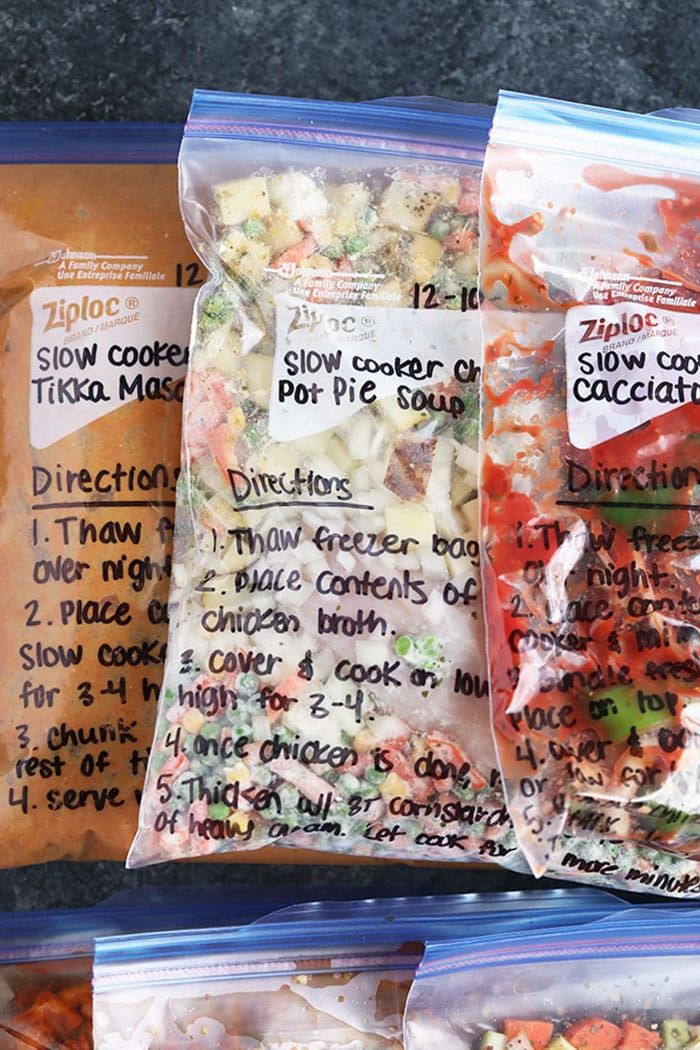 three bags of frozen food sitting on top of a counter