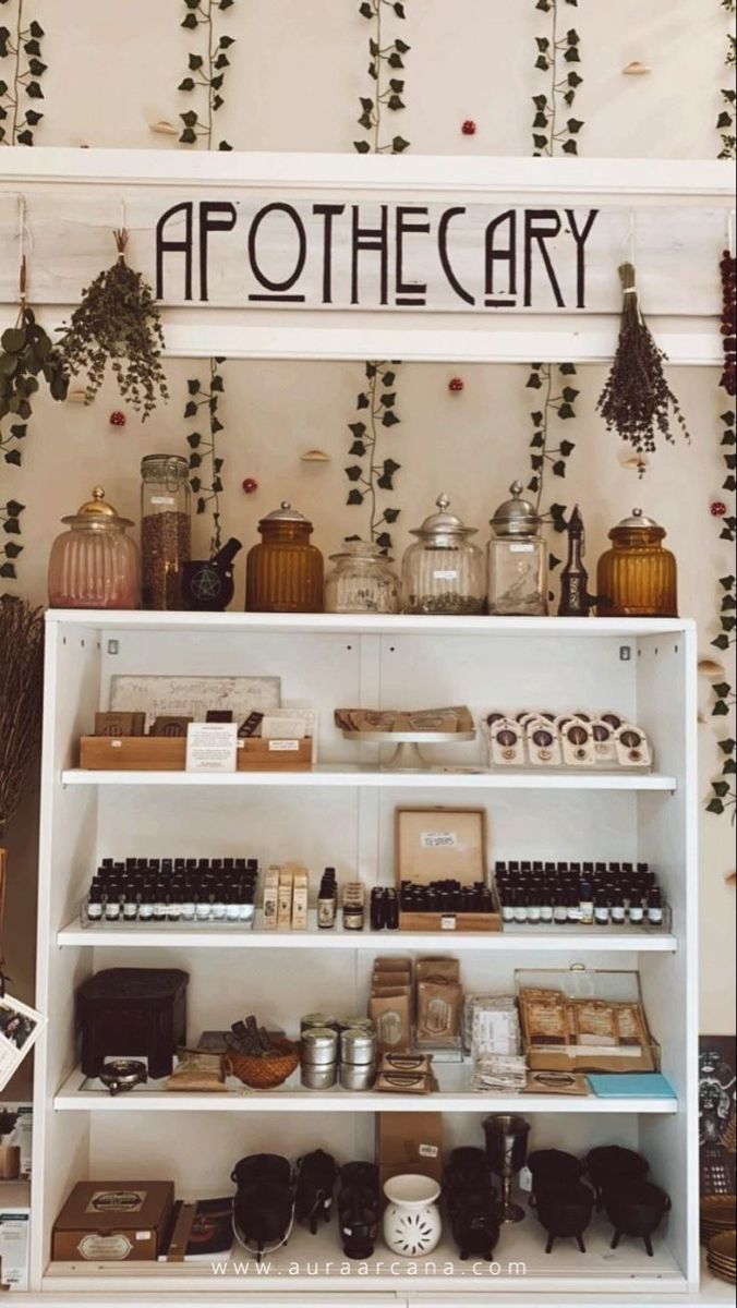 a shelf with various items on it and the words apothecary above it