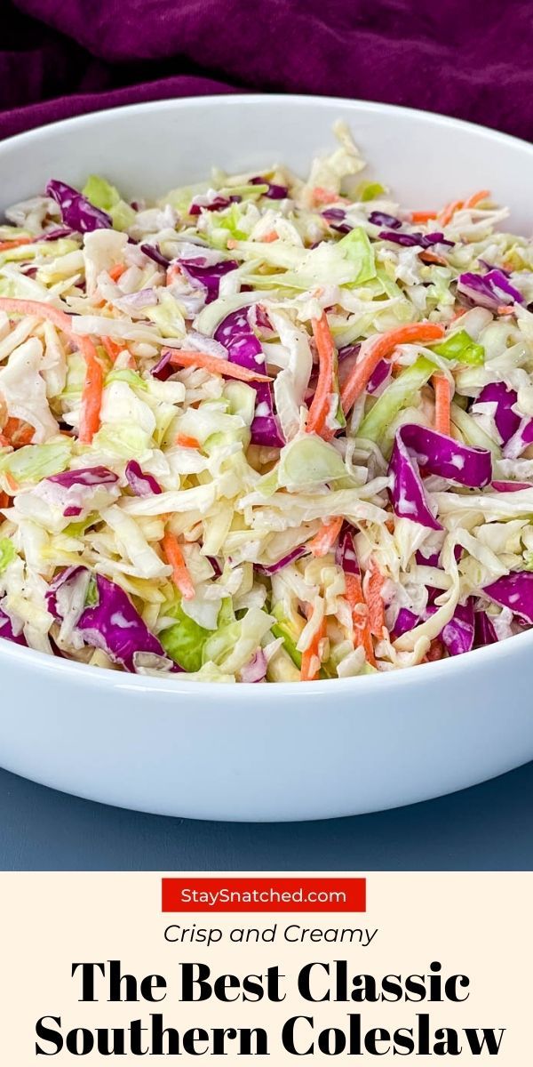 a white bowl filled with coleslaw and carrots on top of a table