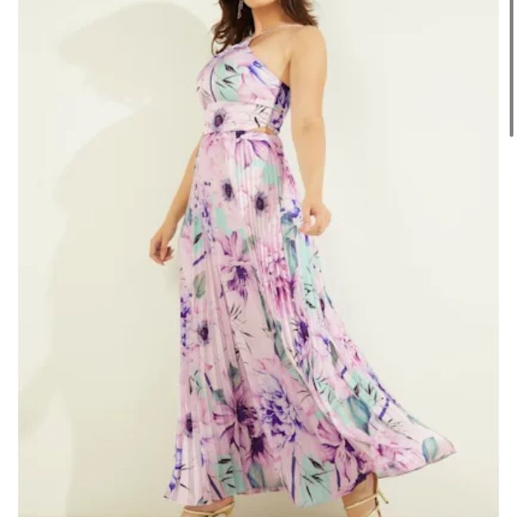 Brand New With Tags. Designed In A Stunning Floral Print, This Floor-Sweeping Maxi Dress Features A Sleeveless Silhouette With High Halter Neckline And Cutouts At The Waist. Finished By A Dramatic Pleated Skirt Purple Halter Neck Maxi Dress For Evening, Purple Pleated Maxi Dress, Spring Evening Purple Maxi Dress, Spring Formal Purple Maxi Dress, Elegant Lavender Maxi Dress With Floral Print, Fitted Purple Pleated Maxi Dress, Purple Floral Print Halter Neck Dress, Purple Halter Neck Floral Print Dress, Purple Halter Neck Dress With Floral Print