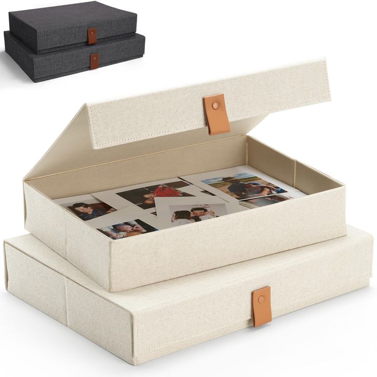 two boxes with pictures in them sitting side by side on top of each other, one opened and the other closed