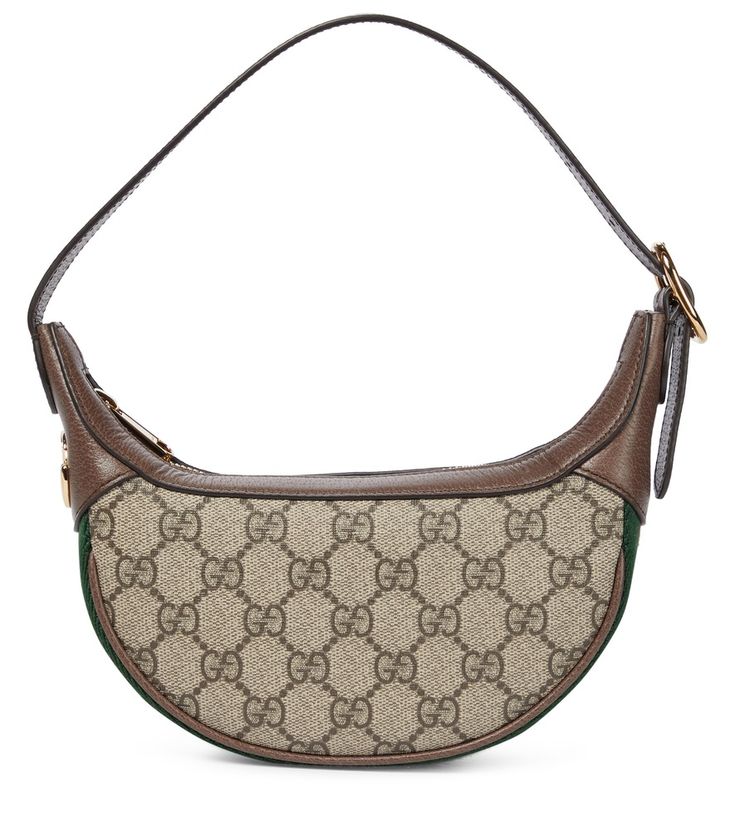 Gucci - Ophidia GG Mini shoulder bag - The '90s are firmly back on the fashion map with the Ophidia GG Mini shoulder bag from Gucci. The compact hemispherical style sits neatly under the arm from a short shoulder drop, and sports the label's iconic GG supreme canvas and web striped border. Brown leather trims and golden GG hardware completes the elegant design. seen @ www.mytheresa.com Gucci Mini Bag, Gucci Mini, Gucci Ophidia, Beige Bag, Mini Shoulder Bag, Canvas Shoulder Bag, Louis Vuitton Damier, Leather Trims, The Fashion