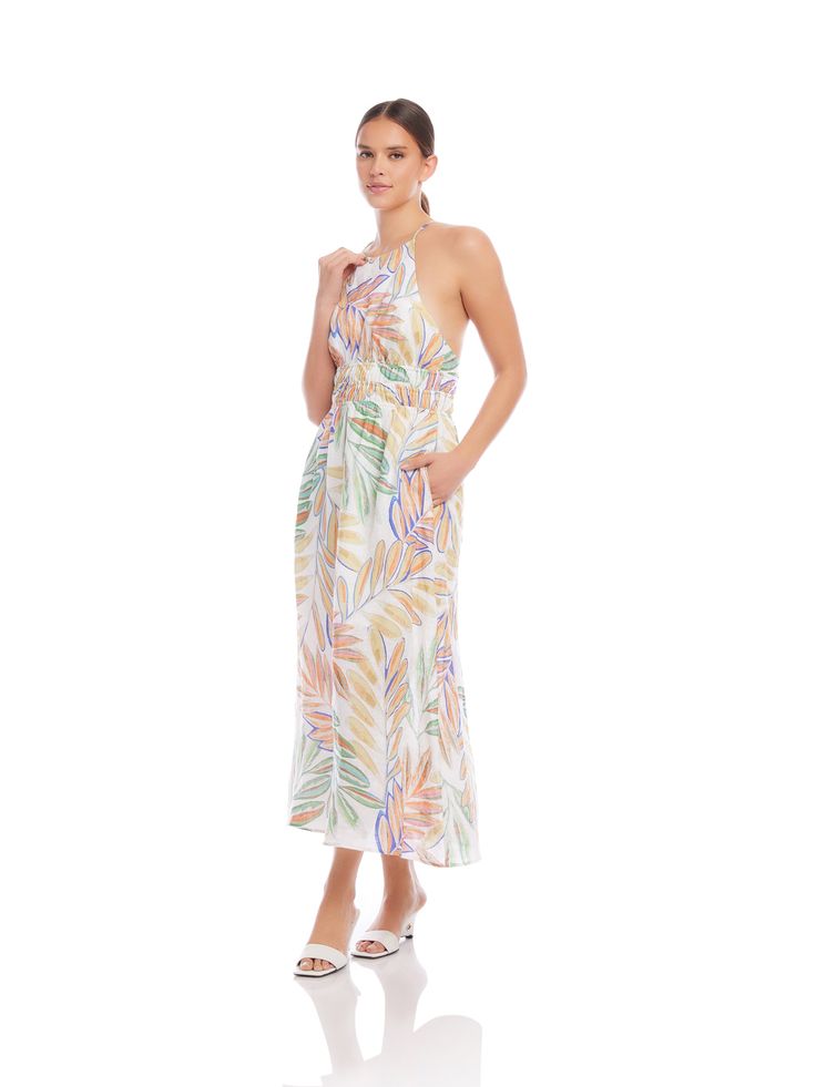 Transport yourself to a tropical paradise with this exotic midi-length dress made of botanical palm print. The lightweight linen fabric provides a breathable feel and drapes beautifully, adding an extra layer of refinement to your look. Ideal for attending a garden party, a beachside soiree, or simply enjoying a leisurely day out, this dress is your go-to choice for effortless style. Botanical Palm Linen Print: 100% Linen Made in the USA of imported fabric Dry Clean Only Length: 52 3/4 inches (s Spring Tropical Print Midi Dress, Tropical Midi Dress With Tropical Print For Day Out, Tropical Midi Dress For Day Out, Beach Linen Dress With Floral Print, Tropical Maxi Dress With Tropical Print For Garden Party, Tropical Midi Dress With Tropical Print, Tropical Midi Dress For Beach With Tropical Print, Tropical Midi Dress For Beach, Linen Floral Print Maxi Dress For Beach