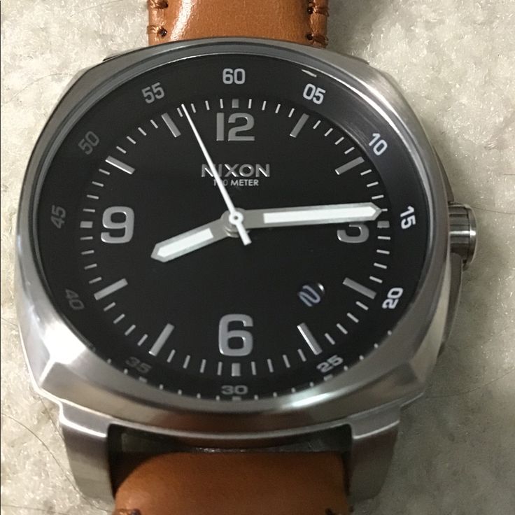 This Is A Beautiful, Near Mint Condition Men's Watch That Goes Well With Blue Denim, Khakis Or Summer Wardrobe. I Suppose You Could Wear It With A Tuxedo, But I Would Recommend White Or Cream Color. The Band Is Light Tan Color, Almost Orange But Not Quite. It's A Rare Nixon Watch That Is No Longer Made And I'm Sure You Will Like It. I Bought This On Poshmark And Then Took It To A Professional Watch Shop And Had A Battery Installed. In No Hurry To Sell Unless Price Can Be Met. Brown Everyday Watches With Subdials, Brown Quartz Watches For Everyday Use, Leather Watch With Analog Display For Everyday, Brown Quartz Watches For Everyday, Leather Watch Accessories With Analog Display For Everyday, Everyday Leather Watch Accessories With Analog Display, Everyday Leather Watch With Analog Display, Everyday Brown Quartz Watches, Casual Brown Watch Accessories With Subdials